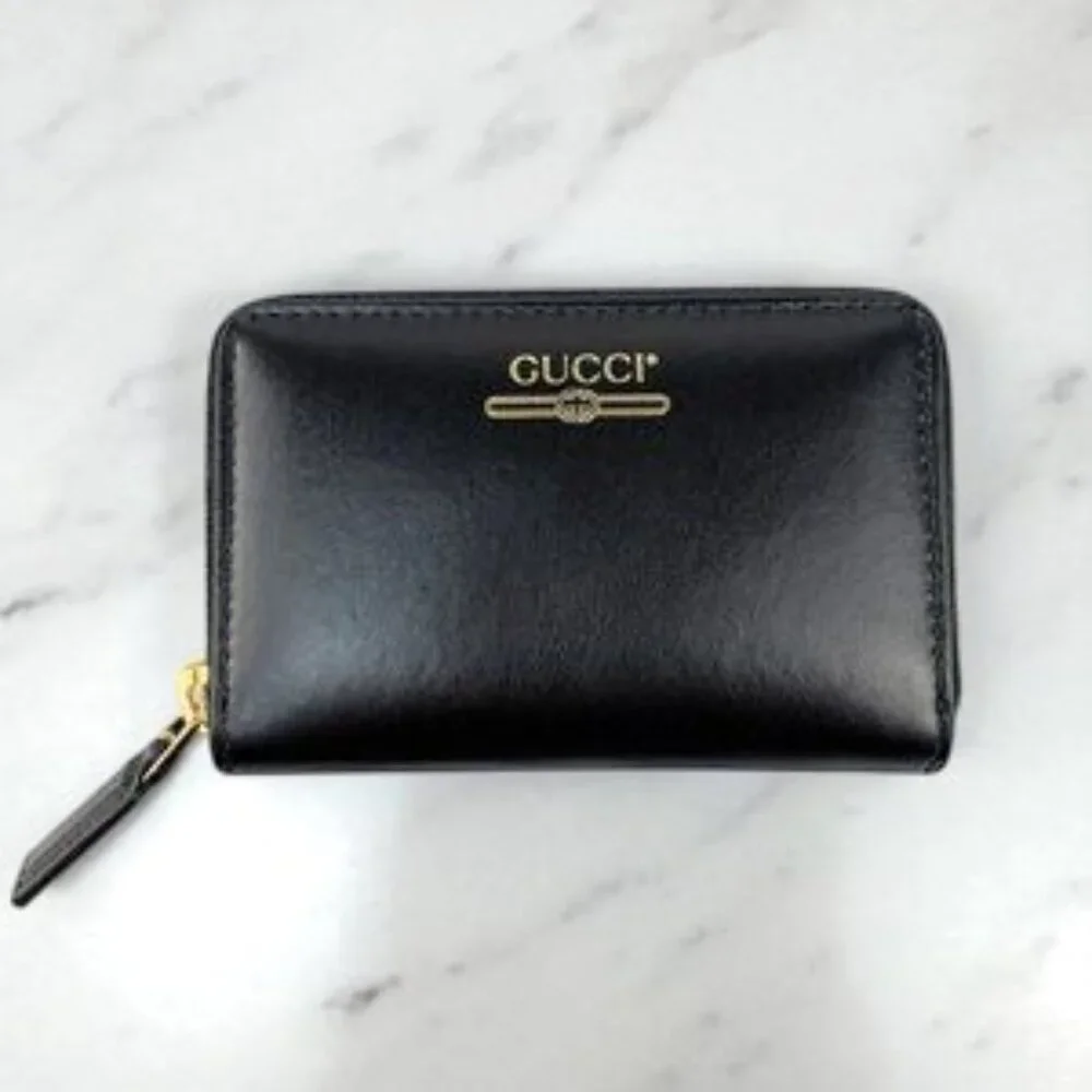 NIB Authentic Gucci zip card case wallet with gucci logo in black